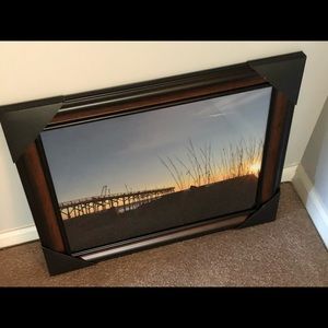 16x20 framed beach sunrise picture.